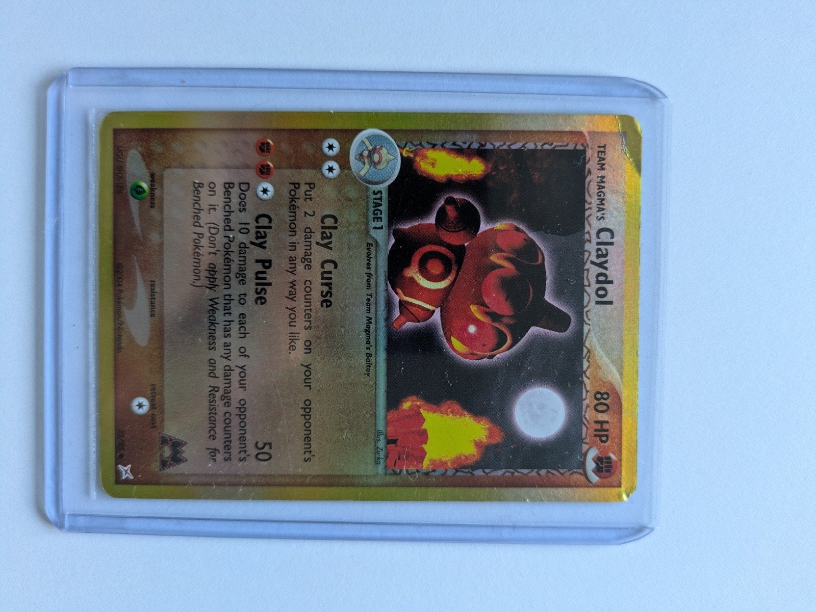 Claydol 33/95 team magma reverse holo, Verzenden