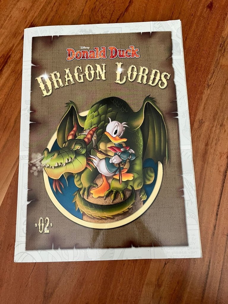 Donald Duck - Dragon Lords 2, Boeken, Eén stripboek, Ophalen of Verzenden, Zo goed als nieuw