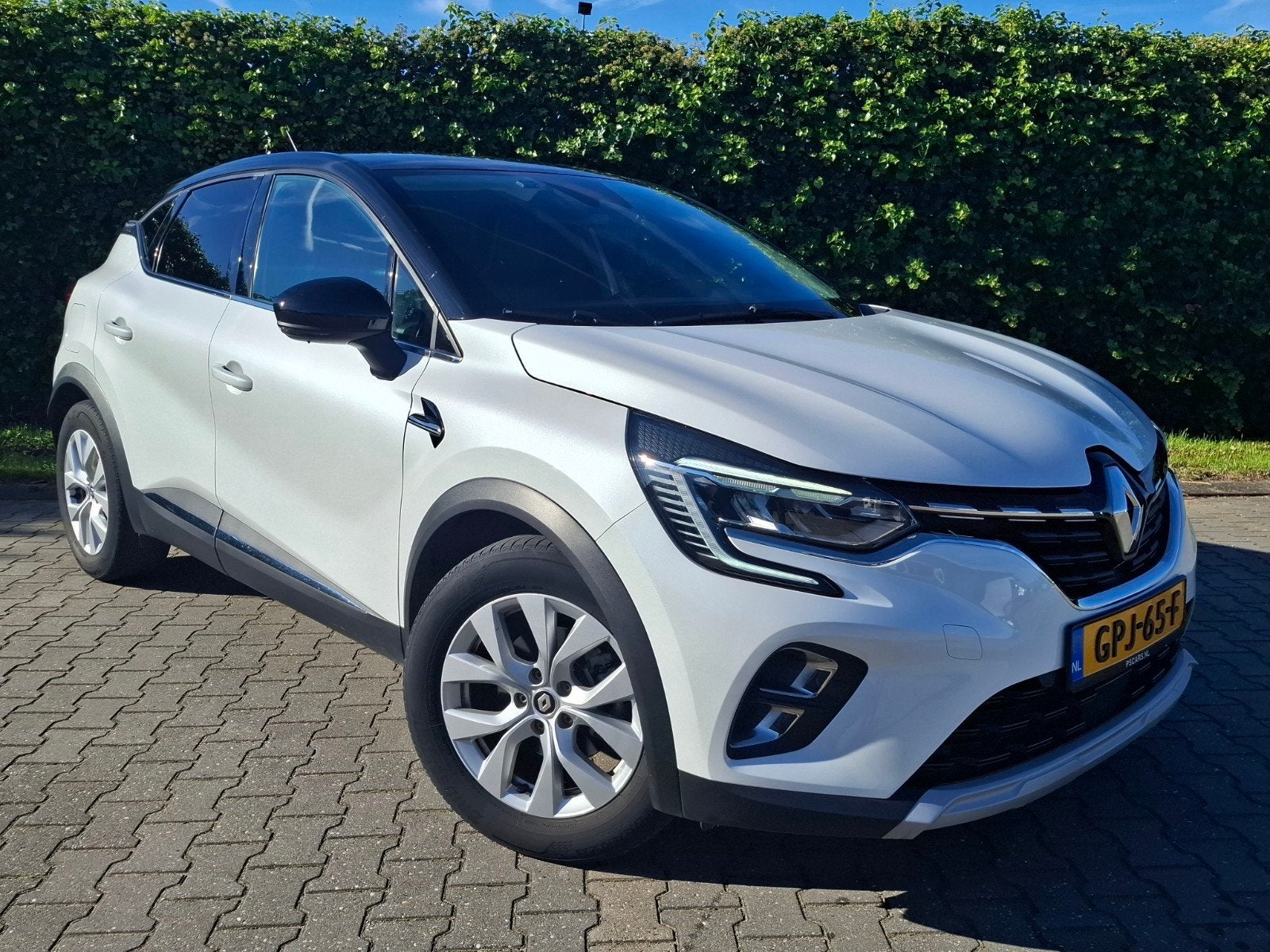 Renault Captur E-tech Hybrid 145pk Aut 2022 Intens Lichtmeta, Auto's, Lane Keeping Assist, 715 kg, Leder en Stof, Wit