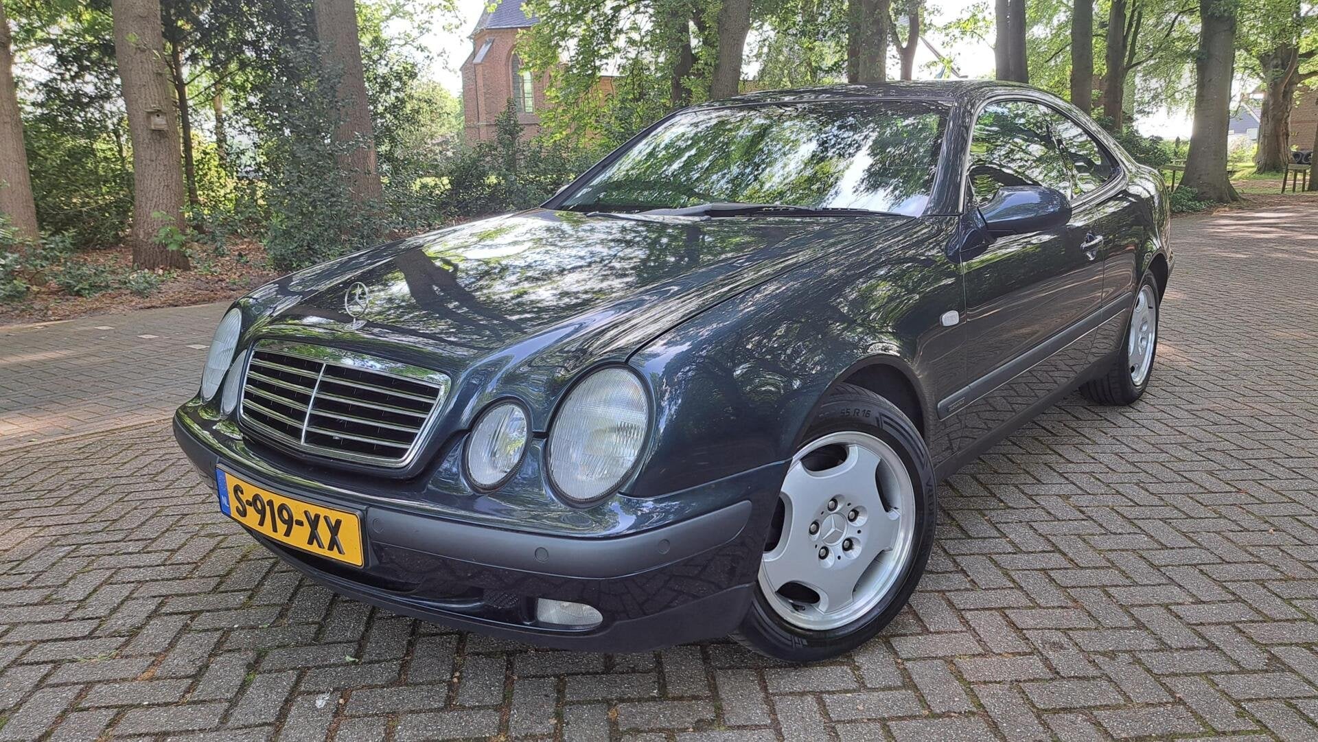 Mercedes CLK-klasse Coupé 320 Elegance aut. NIEUWSTAAT UNIE, Auto's, 745 kg, Achterwielaandrijving, Gebruikt, Zwart