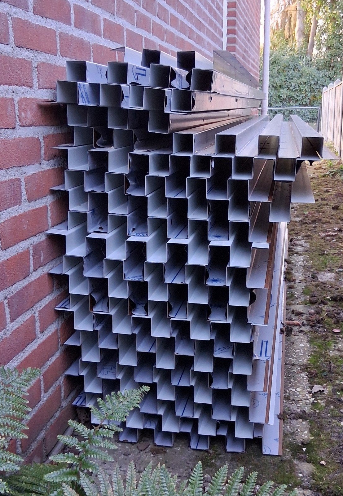 Wandplaat nokprofiel ijzer platen in houtnerf.
Ijzer.
Afwerk, Ophalen, Nieuw, IJzer