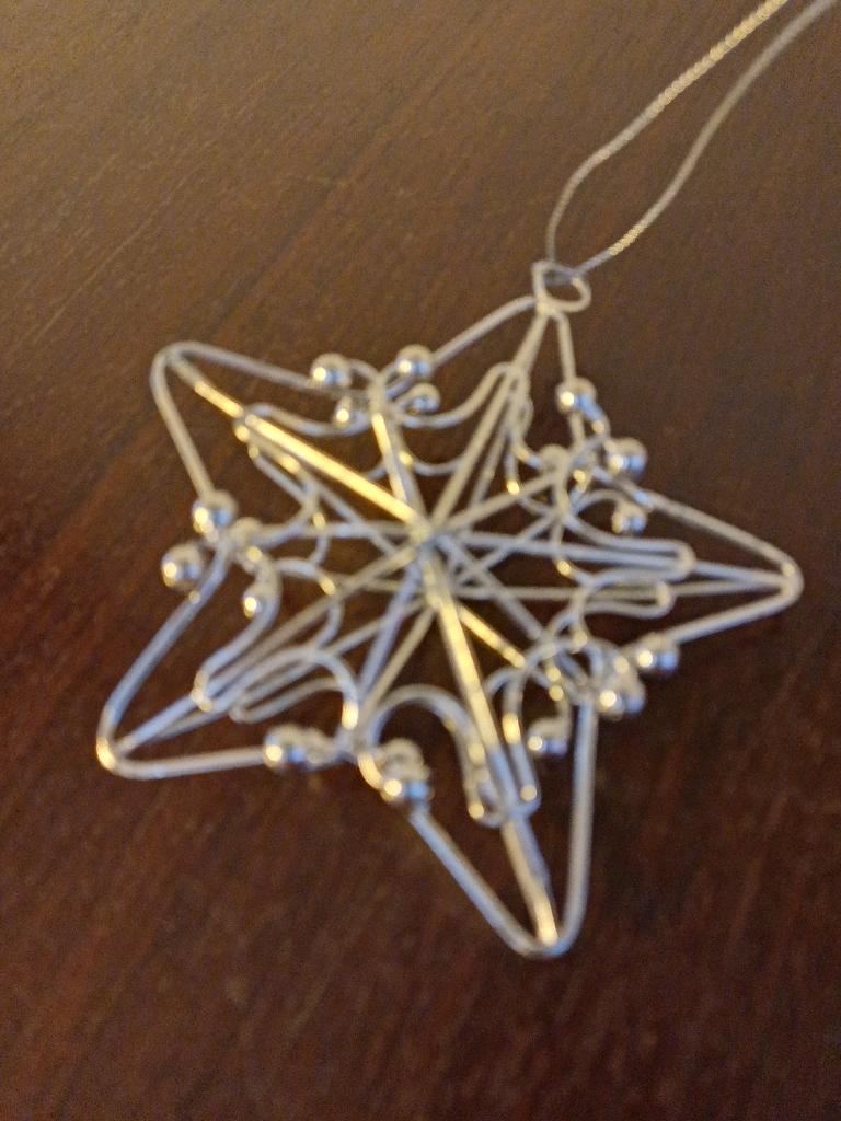 Metalen kersthanger / kerstornament van kerstster te koop, Ophalen of Verzenden, Zo goed als nieuw