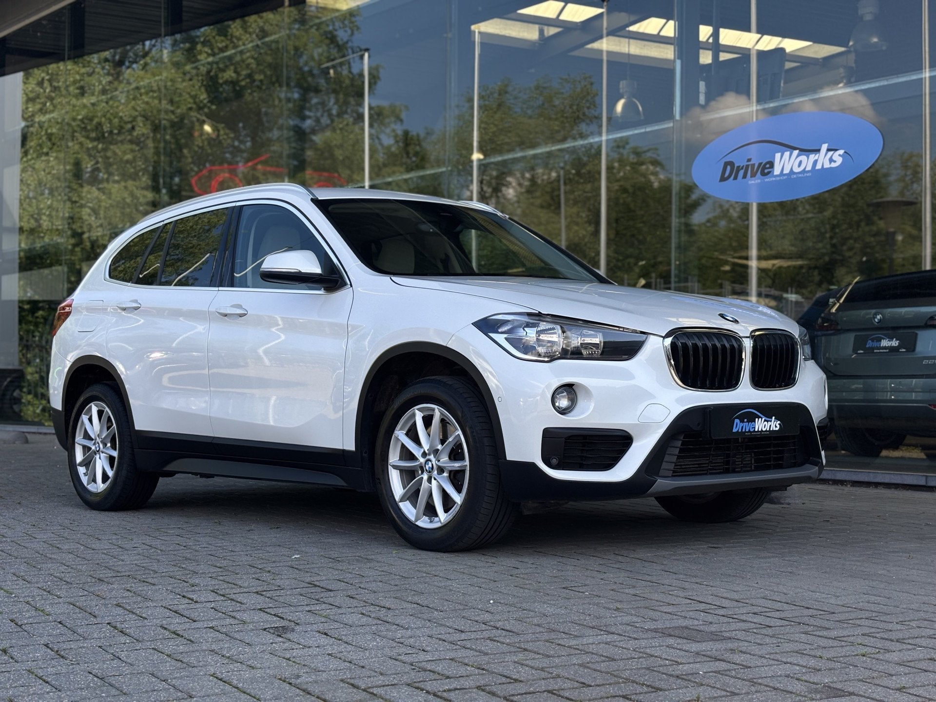 BMW X1 xDrive20i High Executive | Camera | Carplay | Leer |, Auto's, 1998 cc, Gebruikt, Huisgarantie, Met garantie (alle)