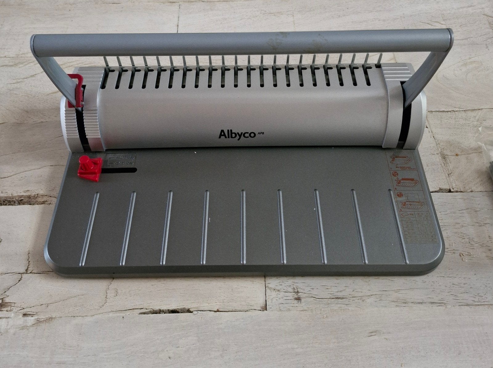 Albyco inbindmachine, Ophalen