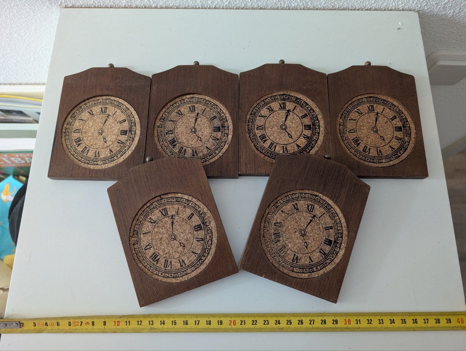 Vintage houten onderzetters met klokmotief – set van 6, Ophalen, Hout