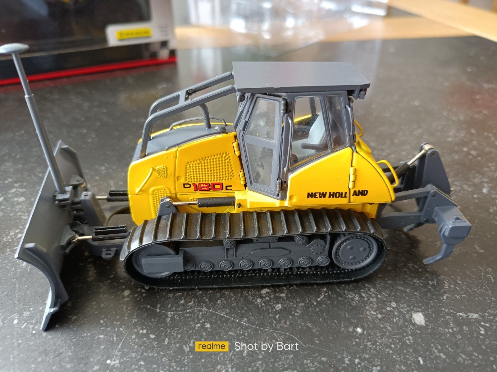 NEW HOLLAND D180C GPS BULLDOZER GEEN CONRAD NZG, Ophalen of Verzenden, Nieuw, Hijskraan, Tractor of Landbouw, Conrad
