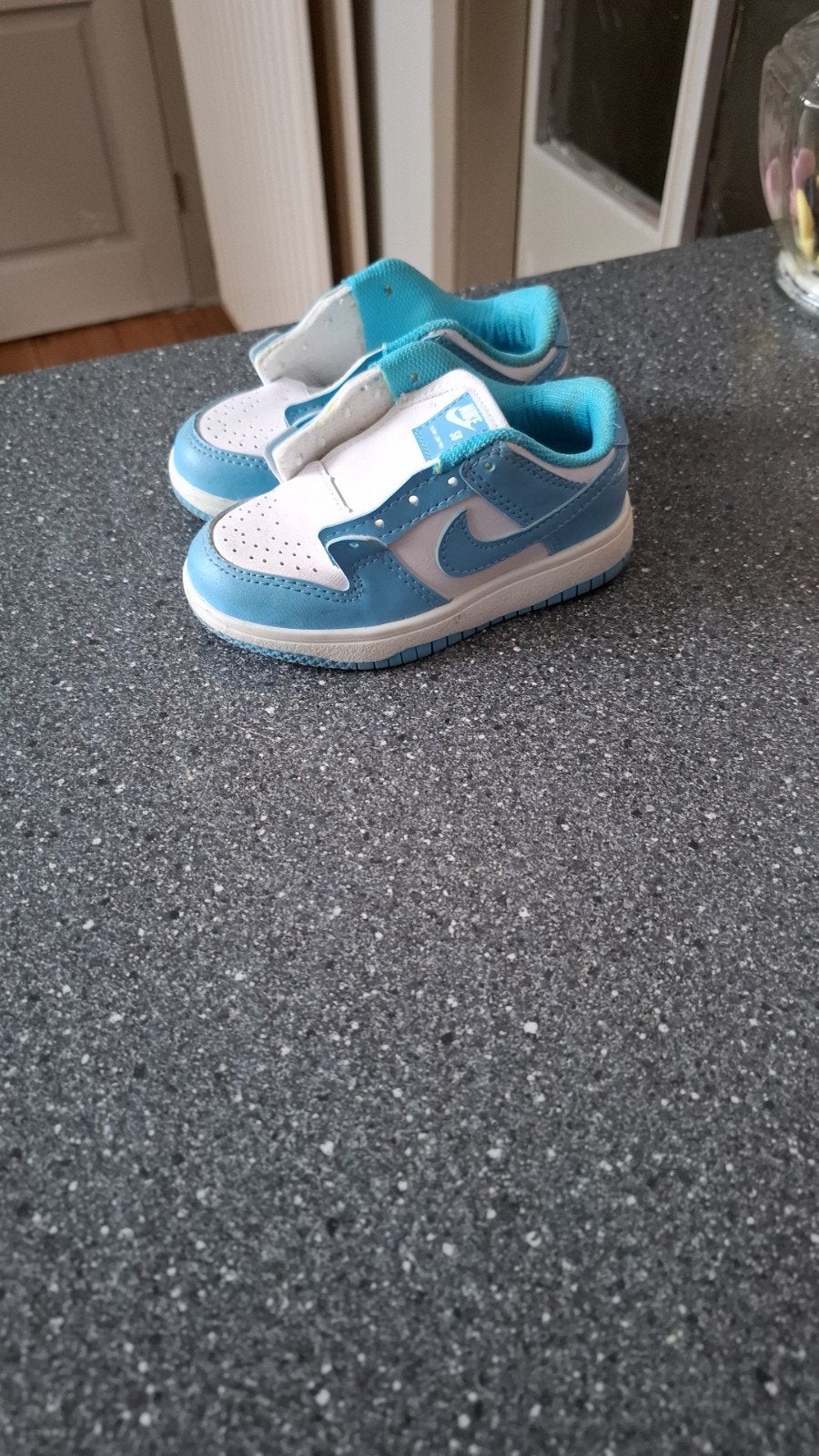 Nike Dunk Low baby sneakers - lichtblauw/wit, Ophalen, Schoentjes, Jongetje of Meisje, Zo goed als nieuw