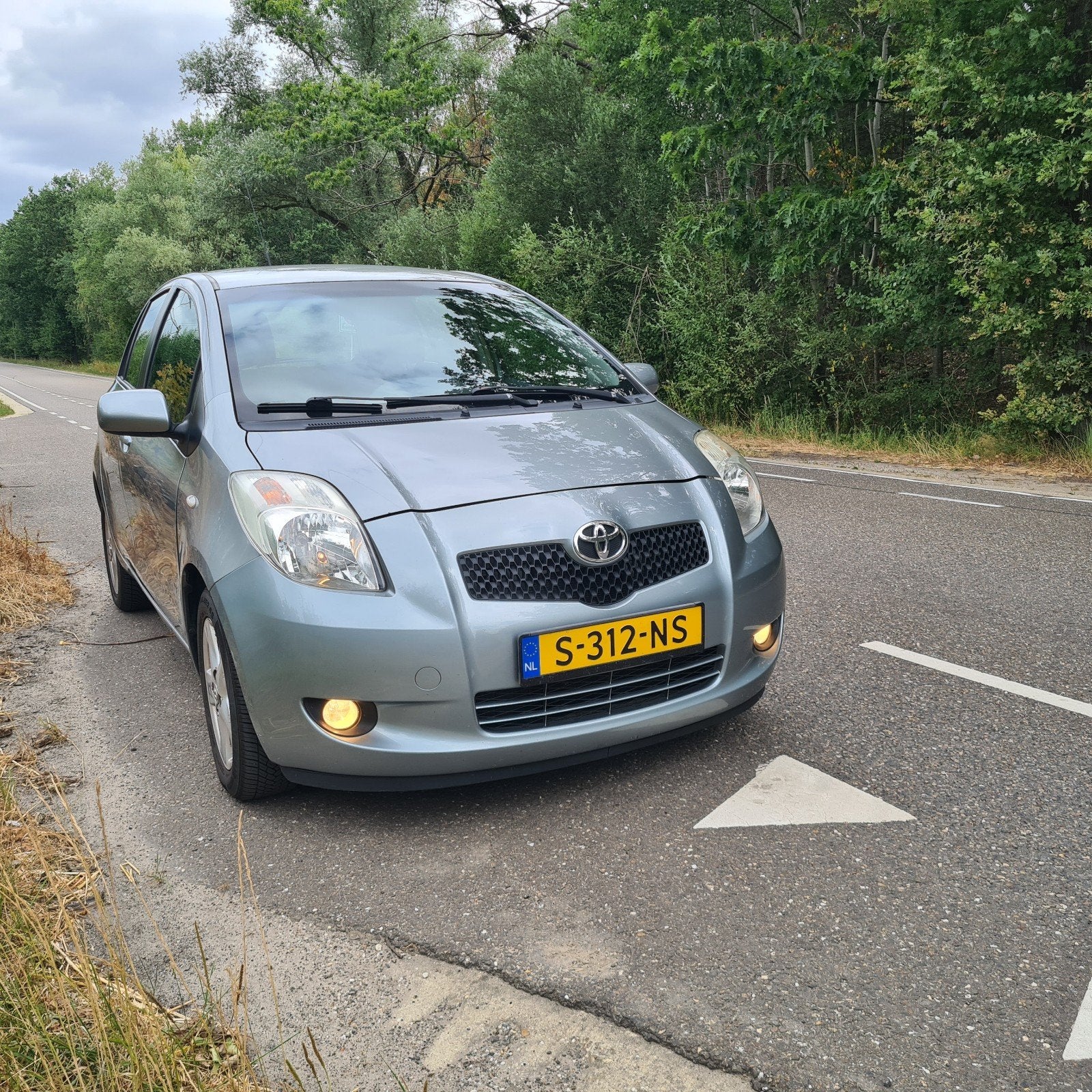 Toyota Yaris 1.3 16V Vvt-i 5DR 2006 Climate Grijs, Auto's, Voorwielaandrijving, 40 €/maand, 4 cilinders, 995 kg