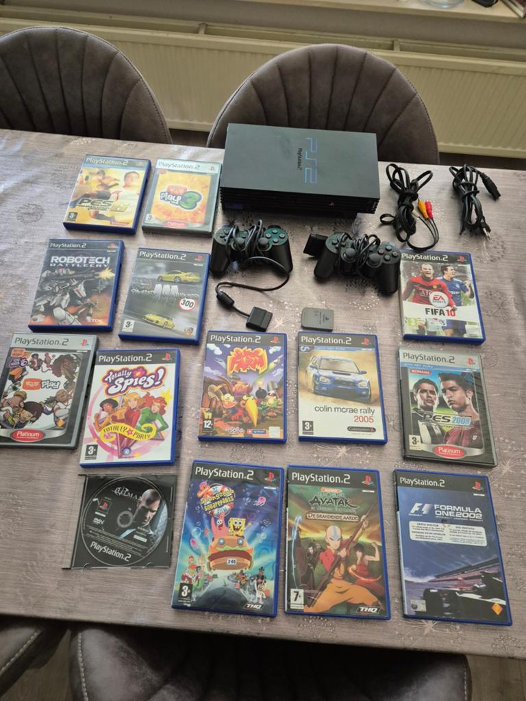 Mega grote familie playstation 2 phat set met veel games, Ophalen of Verzenden, Zo goed als nieuw, Met 1 controller