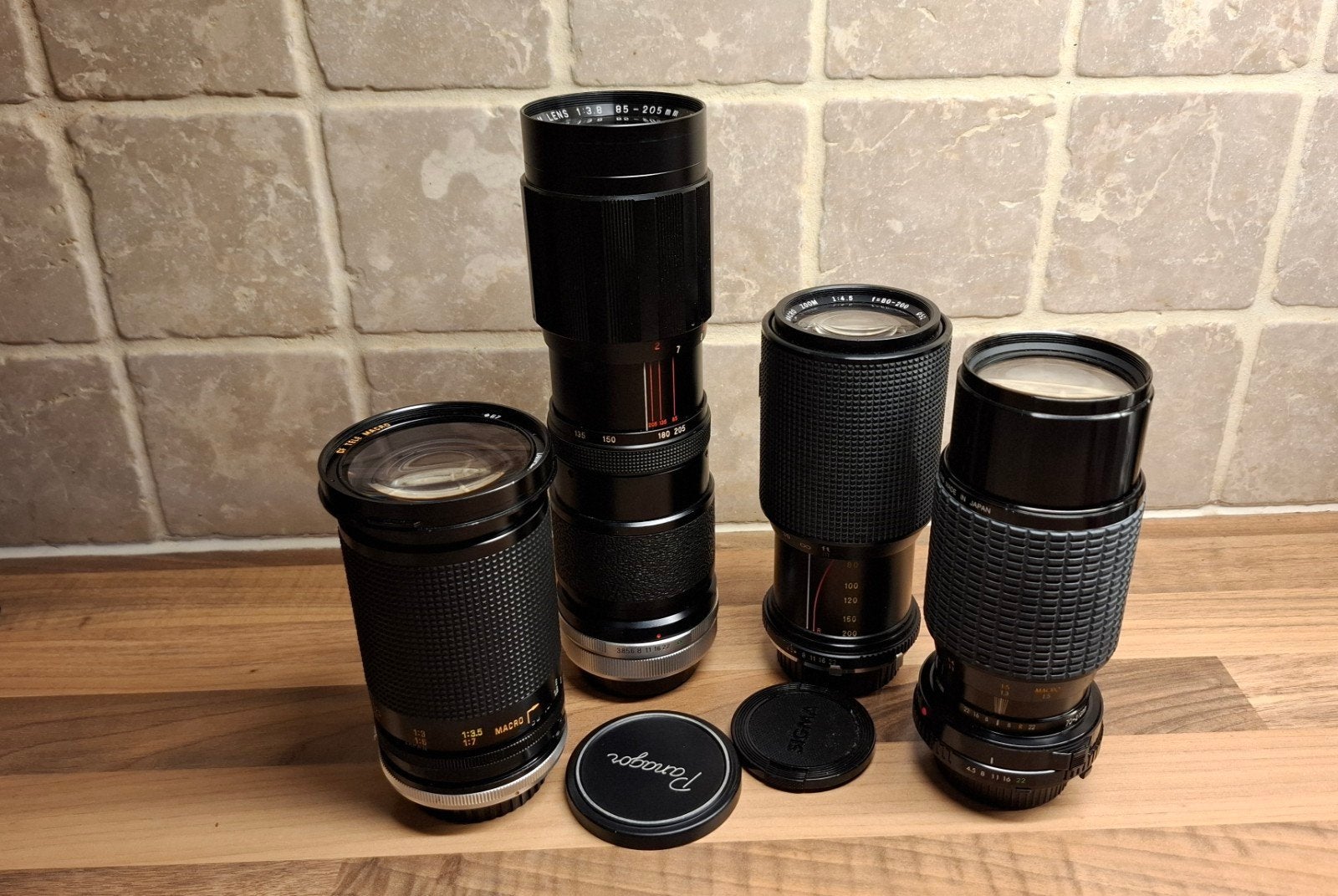 4 lenzen met Canon fd en Minolta md vattingen, Ophalen of Verzenden, Gebruikt, Telelens, Zoom
