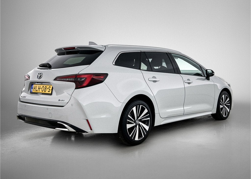 Toyota Corolla Touring Sports Hybrid 140 Dynamic | NL dealer, Auto's, Toyota, 12 maanden, 450 kg, Gebruikt, 4 cilinders