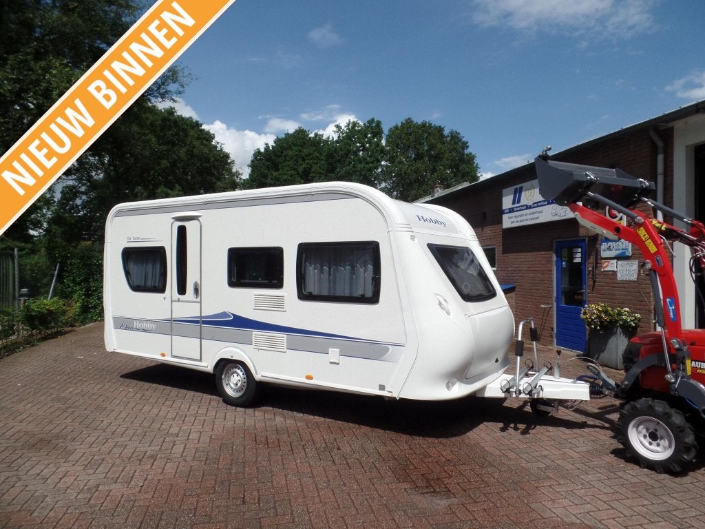 Hobby 455 UF De Luxe Rond zit/ Vast bed/ Voortent, Caravans en Kamperen, Caravans, Rondzit, Hobby, Bedrijf, 4 tot 5 meter