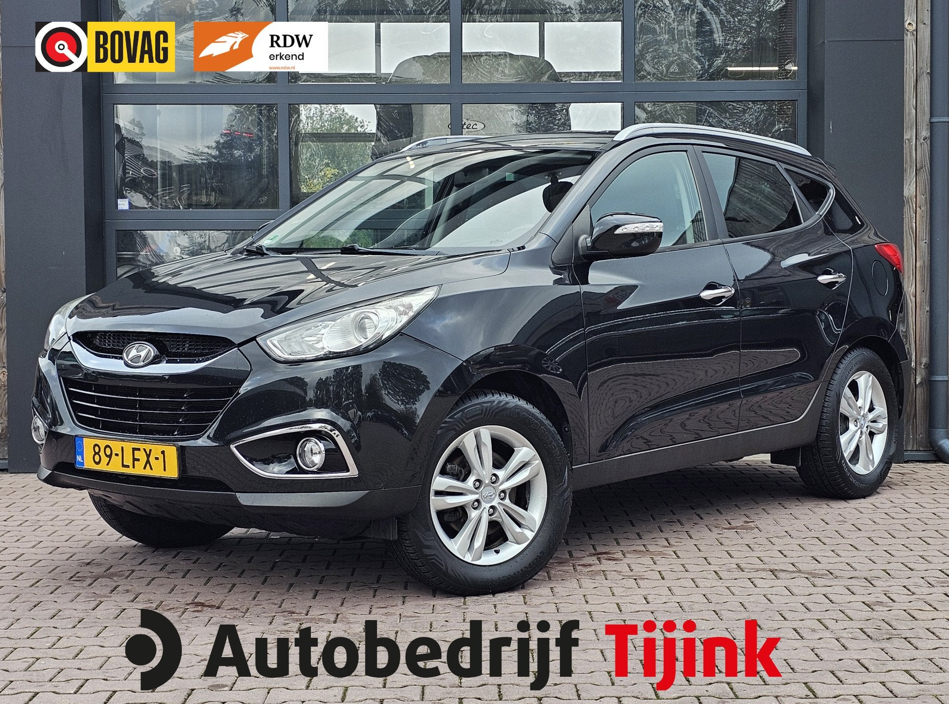 Hyundai ix35 2.0i Style | Automaat | Navi | Trekhaak | Cruis, Gebruikt, Zwart, 4 cilinders, Met garantie (alle)
