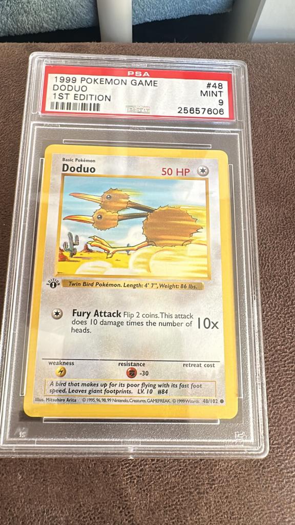 Doduo #48 1st Edition PSA 9 Mint - Pokémon Kaart, Hobby en Vrije tijd, Verzamelkaartspellen | Pokémon, Ophalen of Verzenden, Zo goed als nieuw