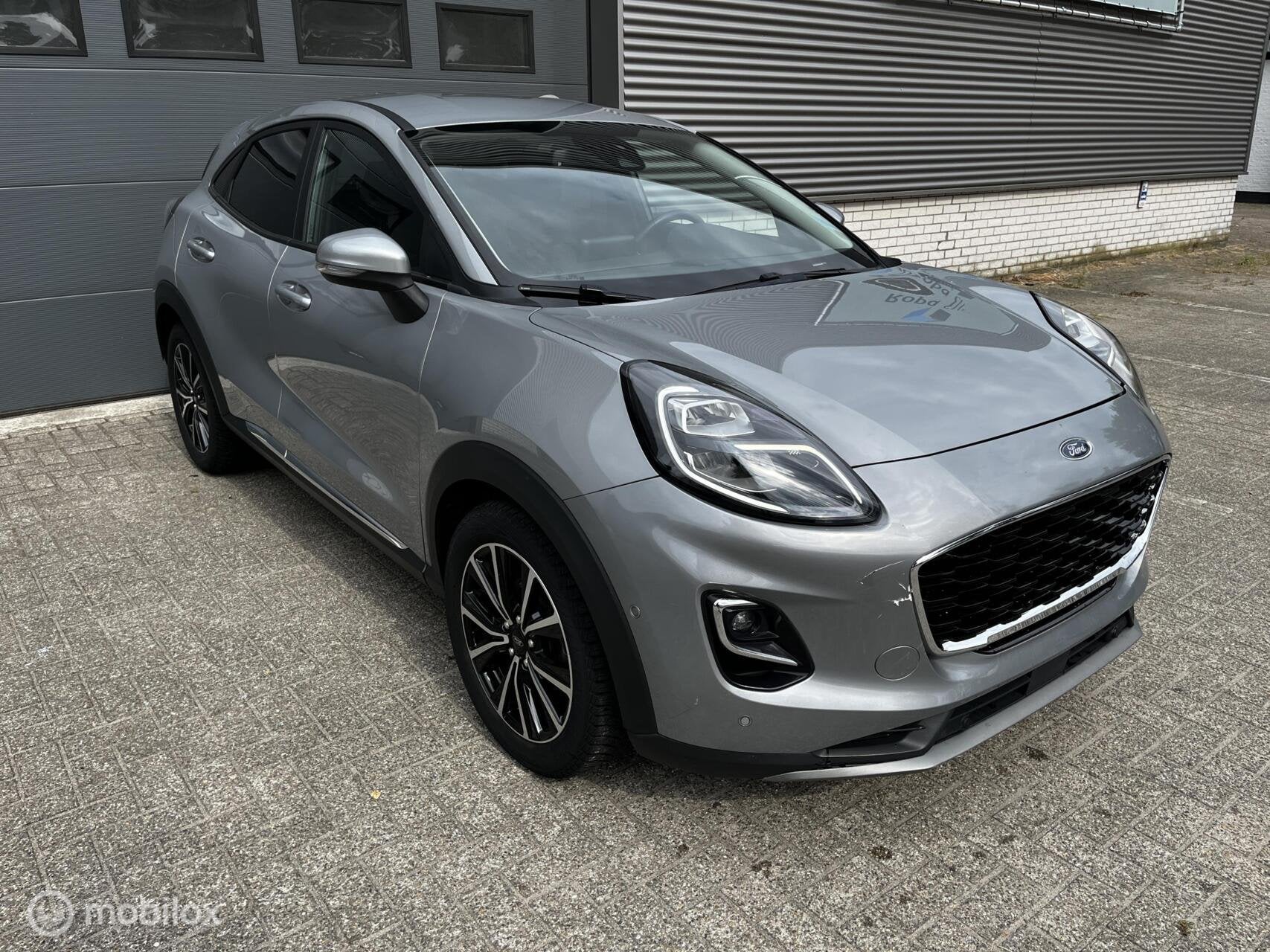 Ford Puma 1.0 EcoBoost CAMERA/CRUISE/NAVI/PDC, Voorwielaandrijving, Zwart, Bedrijf, Automatische klimaatregeling