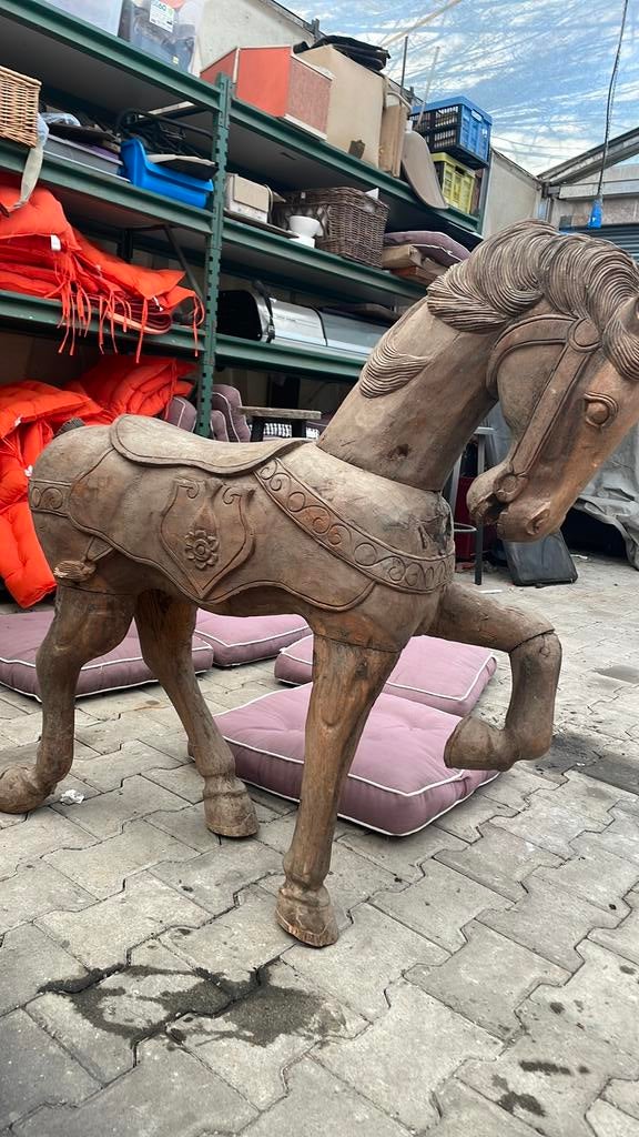 Houten paard, Ophalen