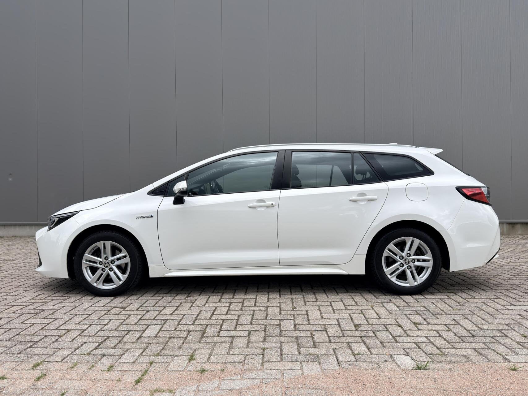 Toyota Corolla Touring Sports 1.8 Hybrid Active Dealer OH|Cr, 450 kg, Gebruikt, 4 cilinders, Met garantie (alle)