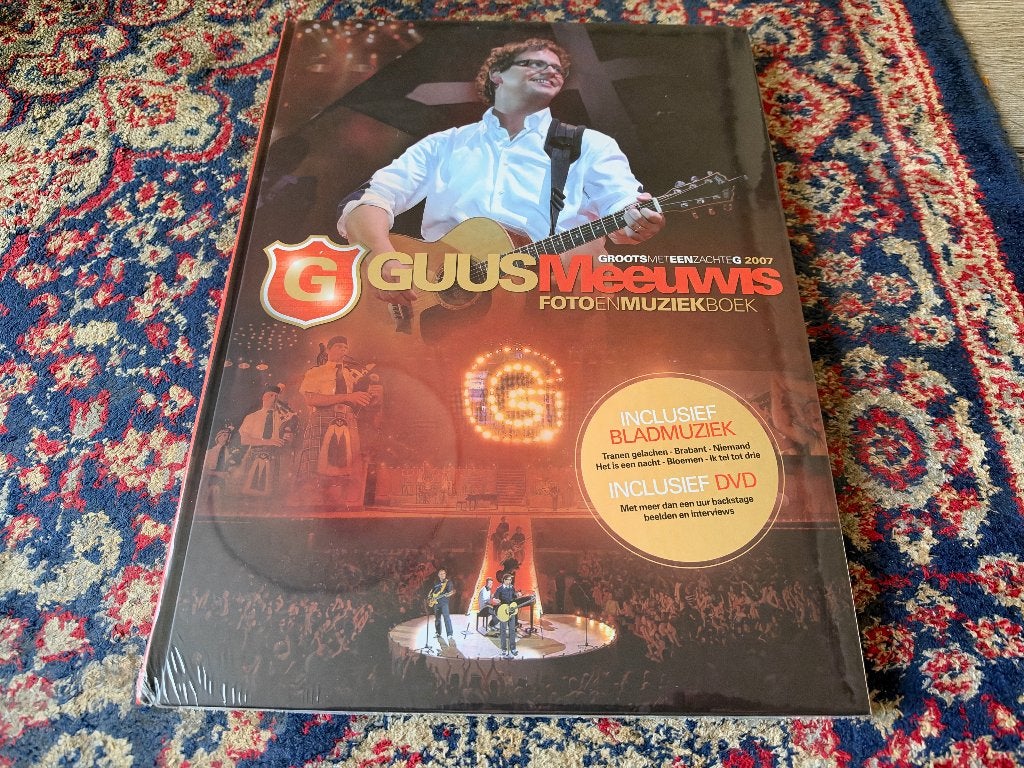 Guus Meeuwis. Foto en Muziekboek. Inclusief bladmuziek en DV, Ophalen of Verzenden, Nieuw, Boek, Tijdschrift of Artikel