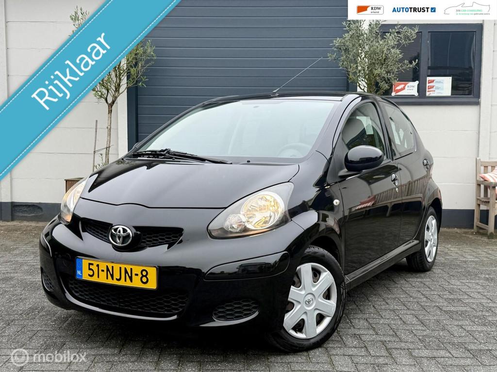 Toyota Aygo 1.0-12V AUTOMAAT|RIJKLAAR|HANDGAS|CRUISE|A-C|NAP, Auto's, Euro 5, Stof, Gebruikt, 4 stoelen