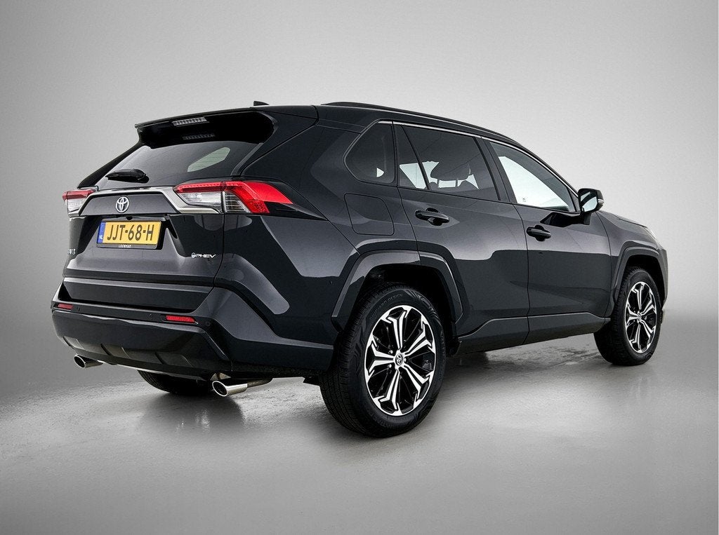 Toyota RAV4 2.5 Plug-in Hybrid AWD Style (bj 2025), Auto's, 12 maanden, Gebruikt, 4 cilinders, Leder en Stof