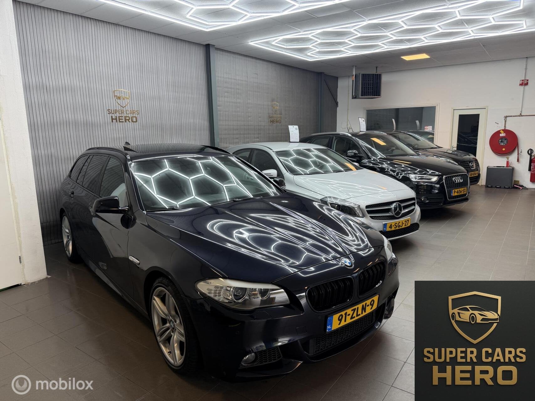 Foto 2 van BMW 5-serie Touring 520i High Executive