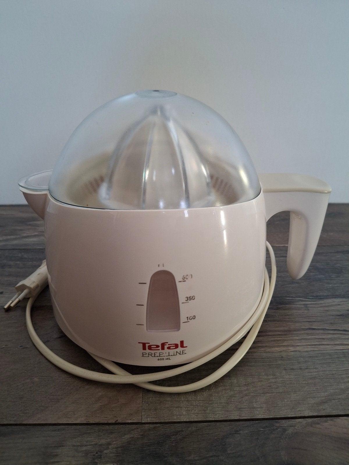 Tefal sinasappelpers, Ophalen
