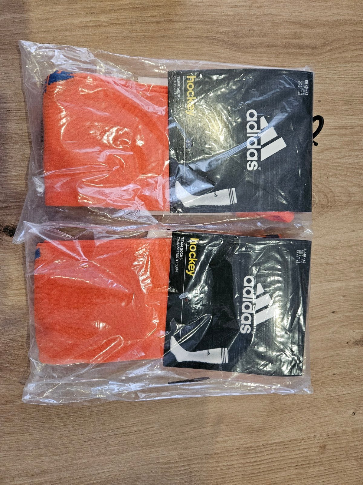 2 paar Oranje Adidas sportsokken maat 40-42, Sport en Fitness, Hockey, Ophalen of Verzenden, Nieuw, Kleding