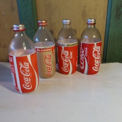 Fles Coca Cola glas 0,5 liter 19 cm hoog SET VAN VIER STUKS, Ophalen of Verzenden, Gebruikt, Gebruiksvoorwerp