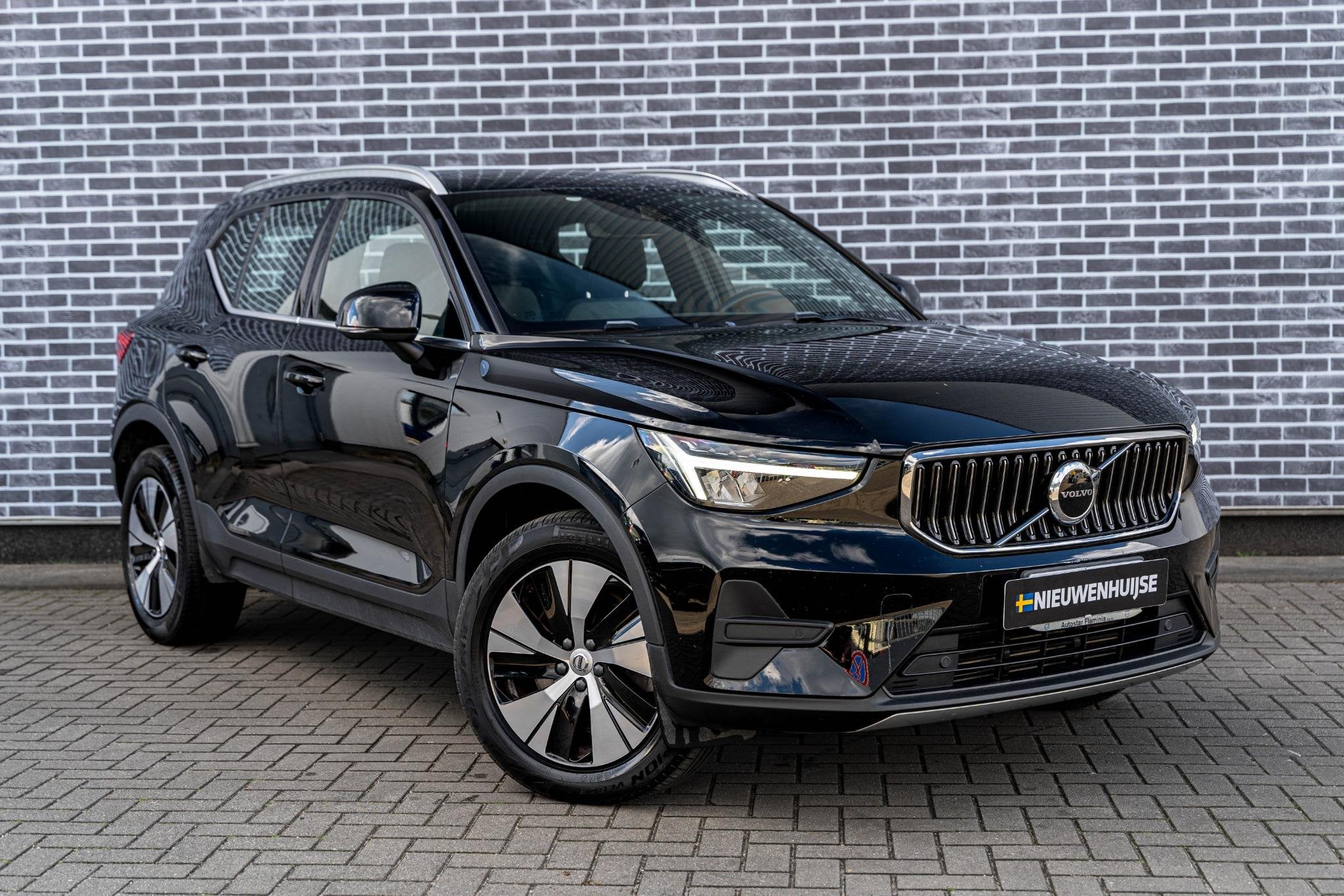 Volvo XC40 1.5 T4 Plug-in Hybrid Core Bright | PHEV | Naviga, Auto's, Volvo, Stof, Euro 6, 1712 kg, Zwart
