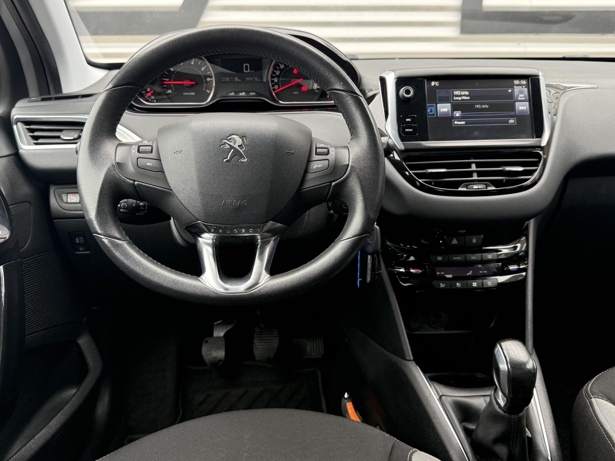 Peugeot 208 1.2 PureTech Style Pack 2e Eigenaar|Navi|Airco|C, Auto's, Voorwielaandrijving, Euro 5, Stof, Gebruikt