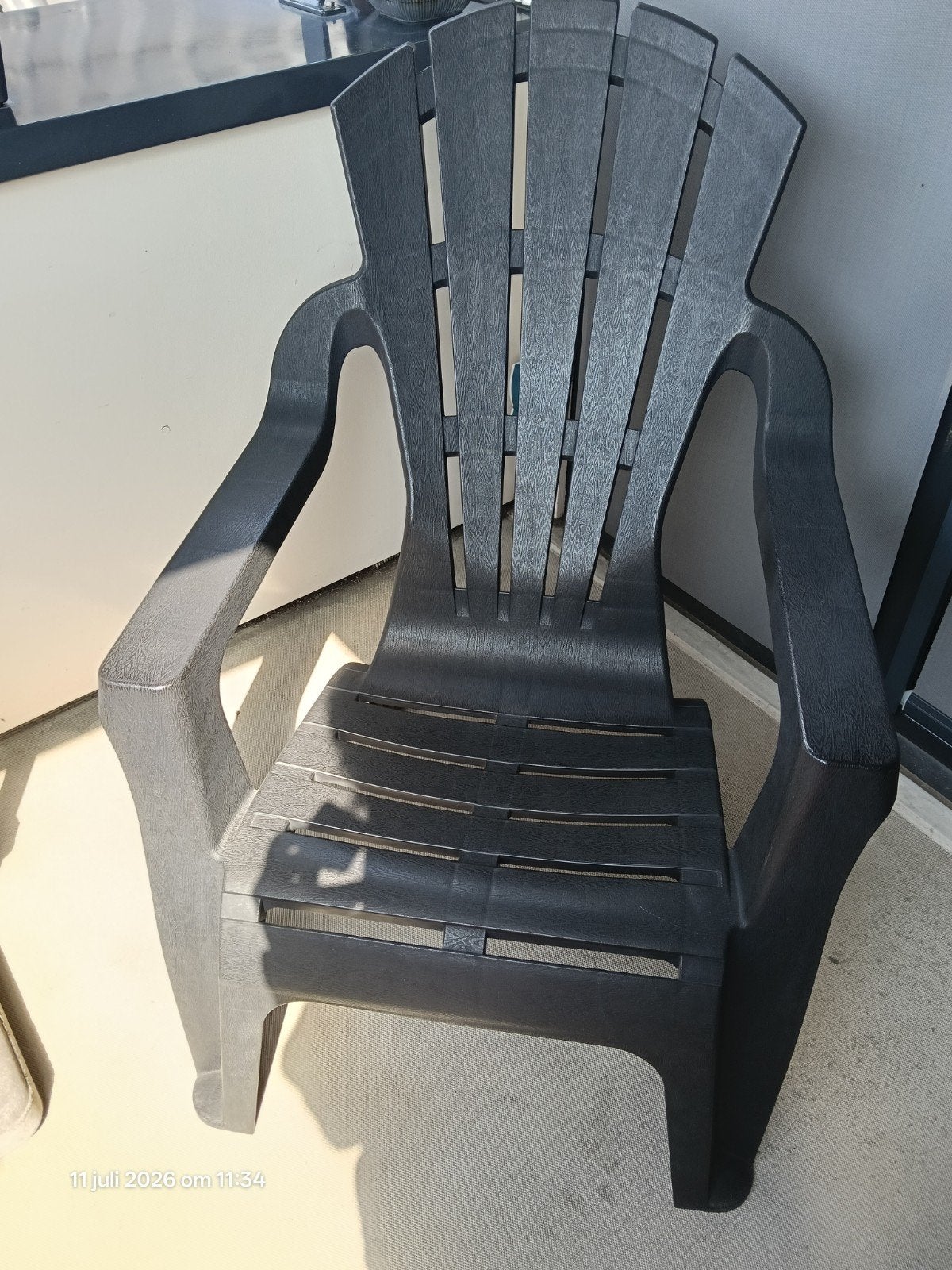 Zwarte lounge stoel., Tuin en Terras, Ophalen, Gebruikt, Kunststof