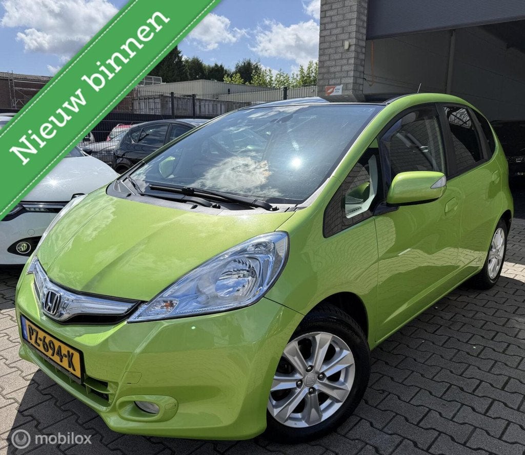 Honda Jazz 1.4 Hybrid Elegance/Unieke Kleur /Automaat /N.A.P, Auto's, Euro 5, Gebruikt, 4 cilinders, 1158 kg