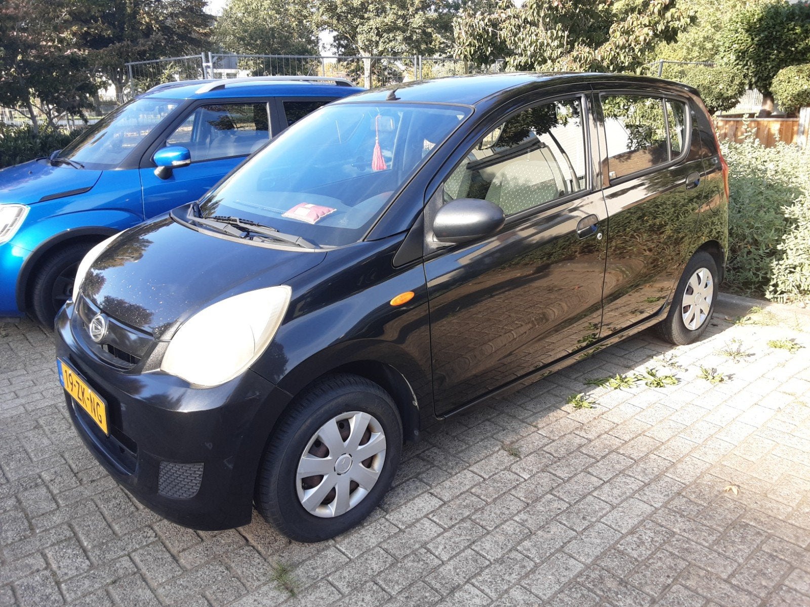 Daihatsu Cuore 1.0 5D 2008 Zwart, Auto's, Voorwielaandrijving, Stof, 600 kg, 18 €/maand