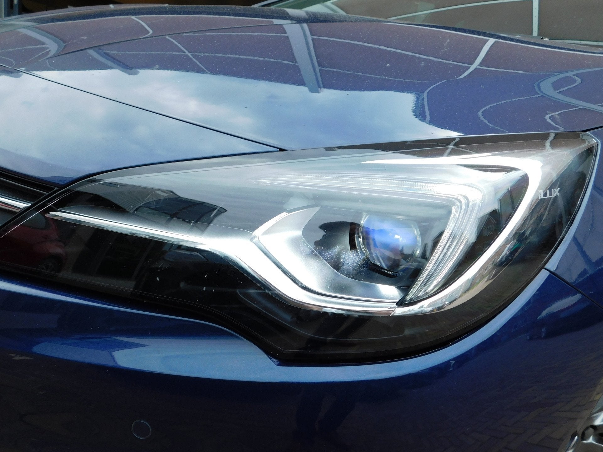 Opel Astra Sports Tourer 1.4 Elegance Automaat (bj 2020), Auto's, Opel, Stof, Gebruikt, Blauw, Origineel Nederlands