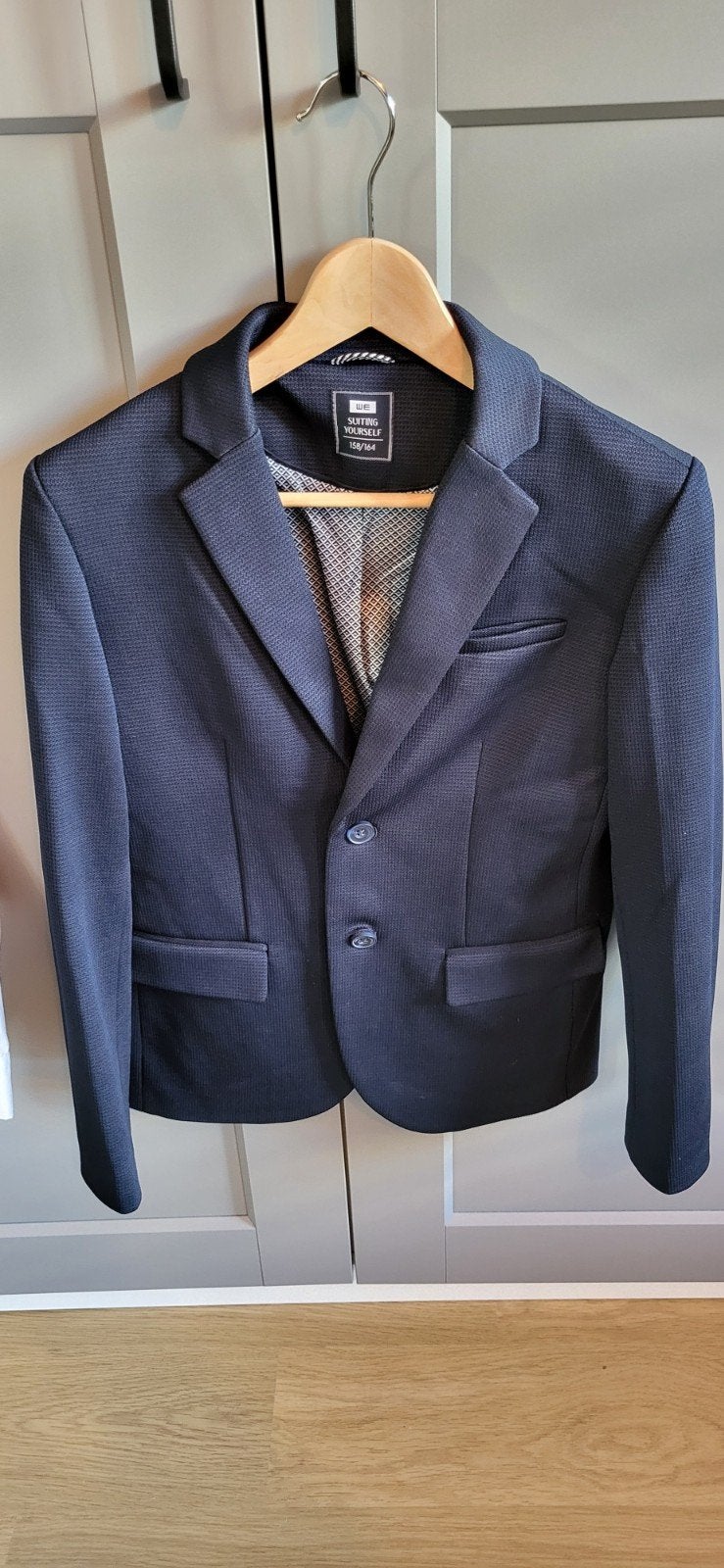 Donkerblauw pak (colbert en broek) - WE, Ophalen of Verzenden, Zo goed als nieuw, Jongen