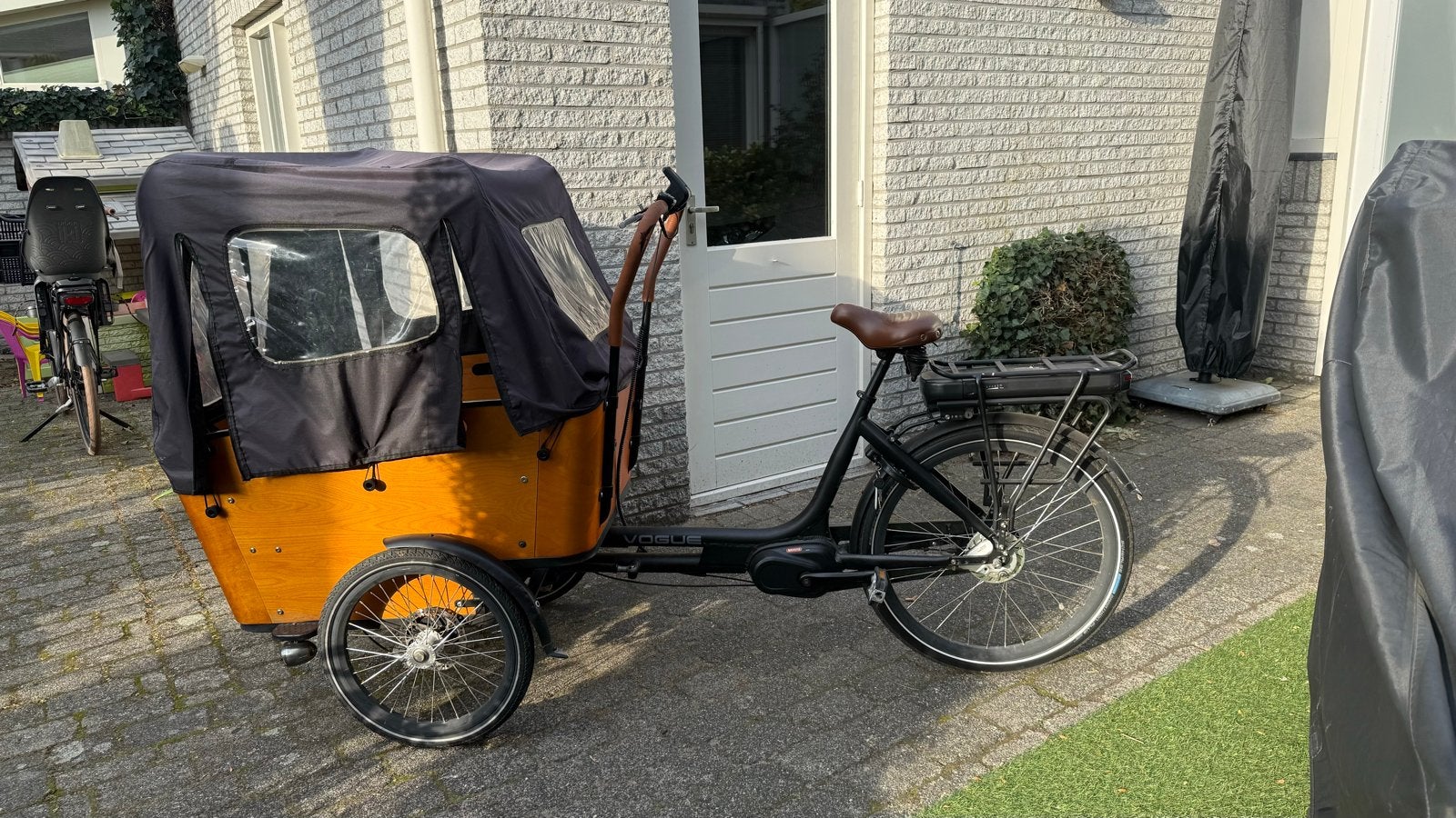 Bakfiets Vogue Carry 3 Elektrisch met Huif, 4 kinderen of meer, Gebruikt, Elektrisch, Schijfrem