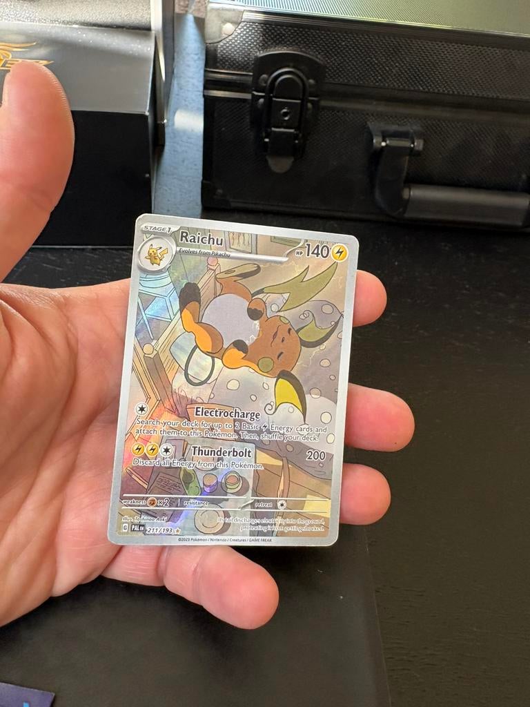 Raichu paldea evolved, Ophalen of Verzenden, Zo goed als nieuw, Meerdere kaarten, Foil