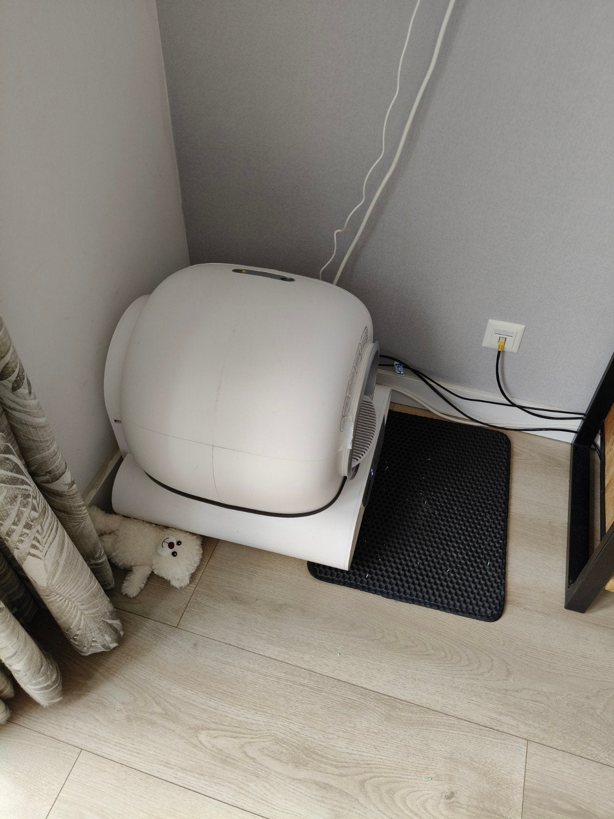 Wop kattenbak, Ophalen