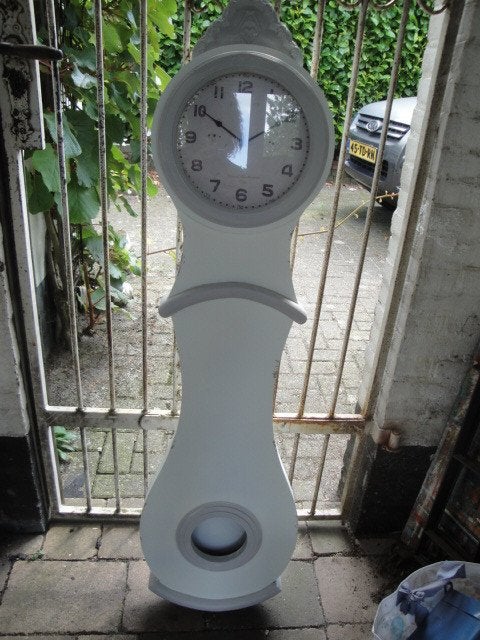 grote hangende klok, Ophalen