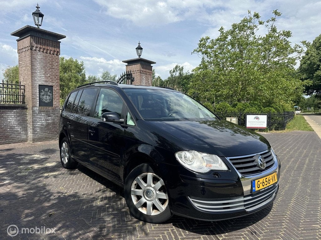 Volkswagen Touran 1.6 2009 7-personen Airco Navi Cruise✅, Auto's, Voorwielaandrijving, Euro 5, Stof, Gebruikt