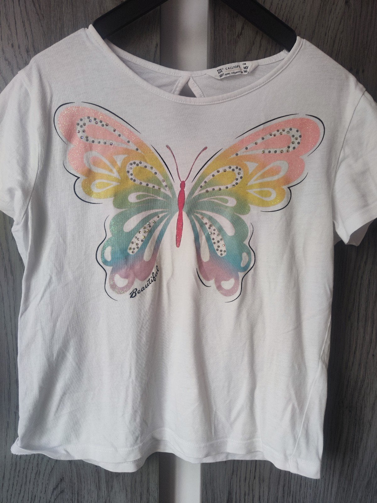 Wit shirtje met vlinder maat 140/146, Meisje, Ophalen of Verzenden, Zo goed als nieuw, Shirt of Longsleeve