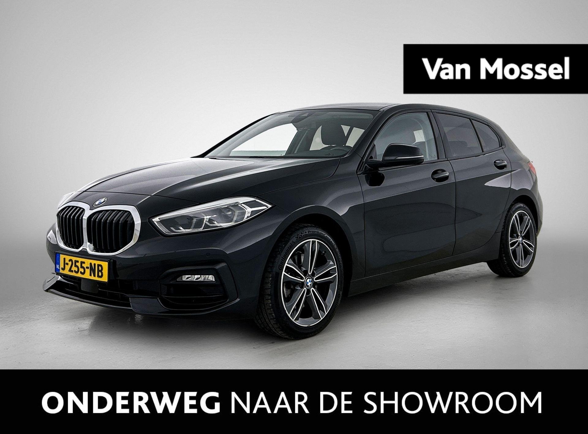 BMW 1-serie 118i Executive Edition, 12 maanden, Gebruikt, Leder en Stof, Zwart