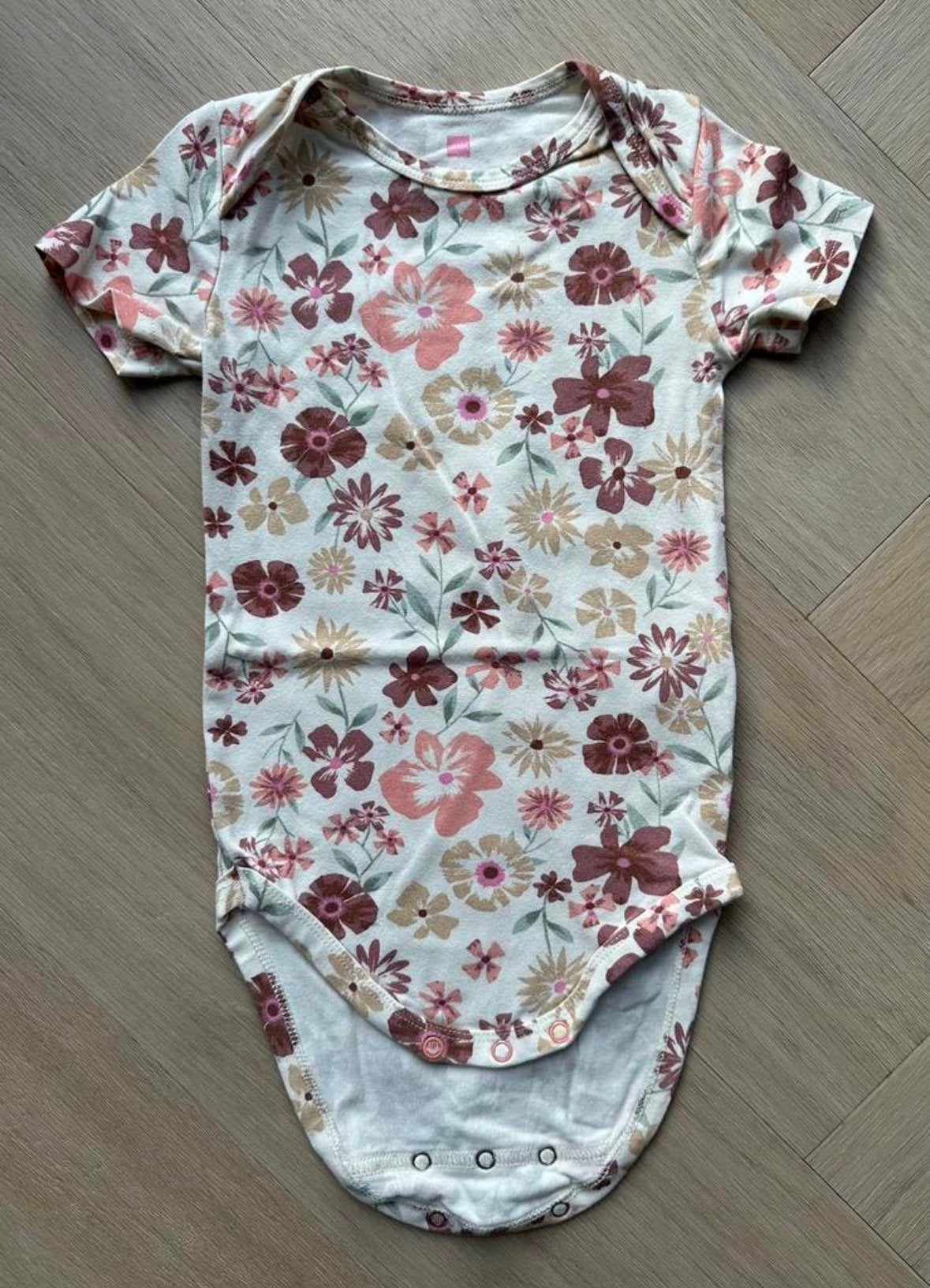 HEMA meegroei romper bloemen maat 74/80 | babykleding, Ophalen of Verzenden, Zo goed als nieuw, Meisje, Nacht- of Onderkleding