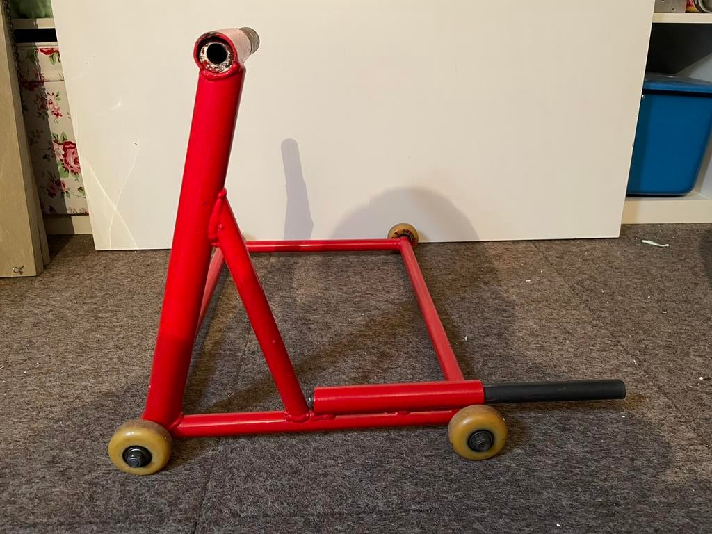 Paddockstand achter, Motoren, Ophalen