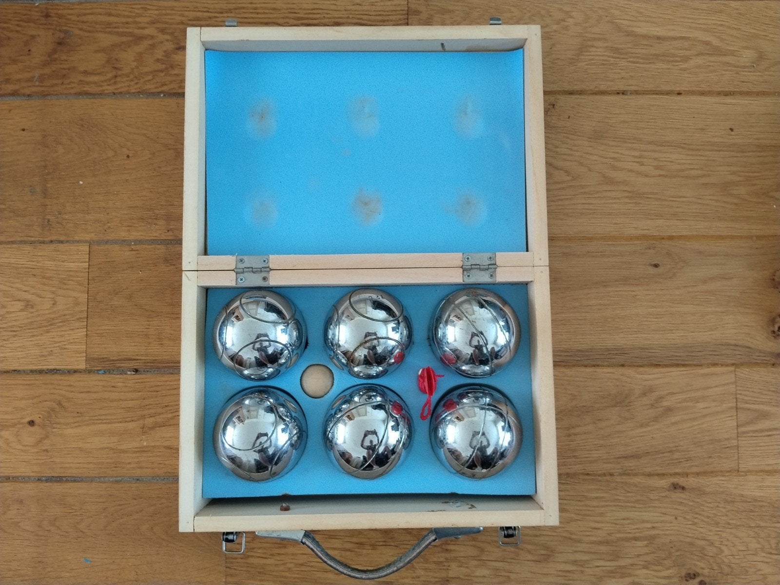 Jeu de boules setje, Ophalen