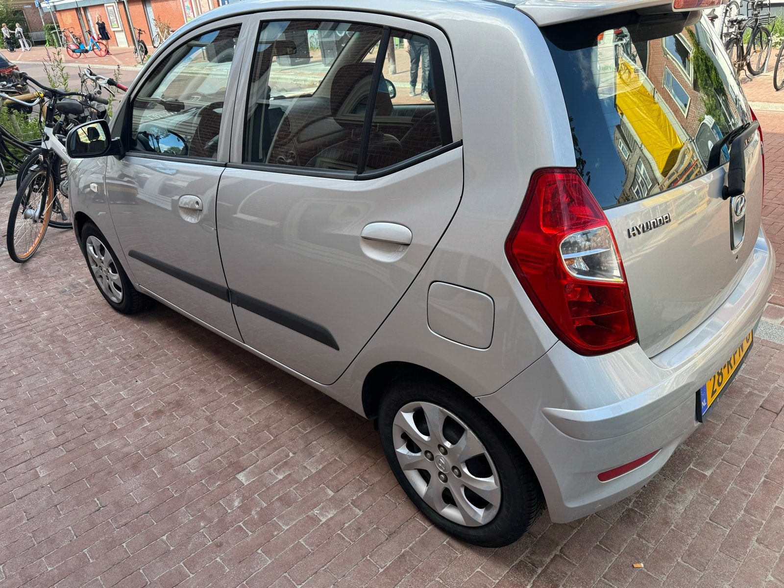 Hyundai i10 1.1 I 5DR 2011 Grijs met nieuwe apk!!!, 4 cilinders, 400 kg, Leder en Stof, Origineel Nederlands