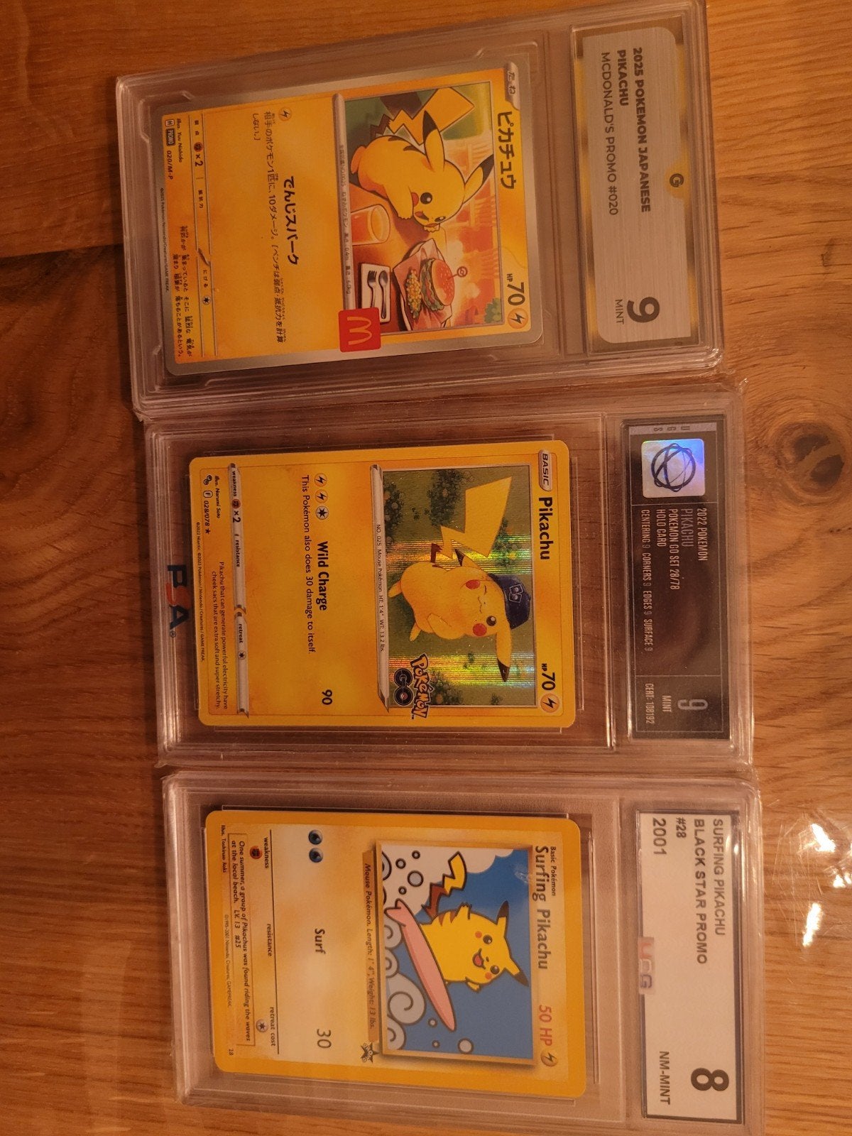 Pikachu Graded Slabs: McDonald's, Pokémon GO, Surfing, Ophalen of Verzenden, Zo goed als nieuw, Meerdere kaarten