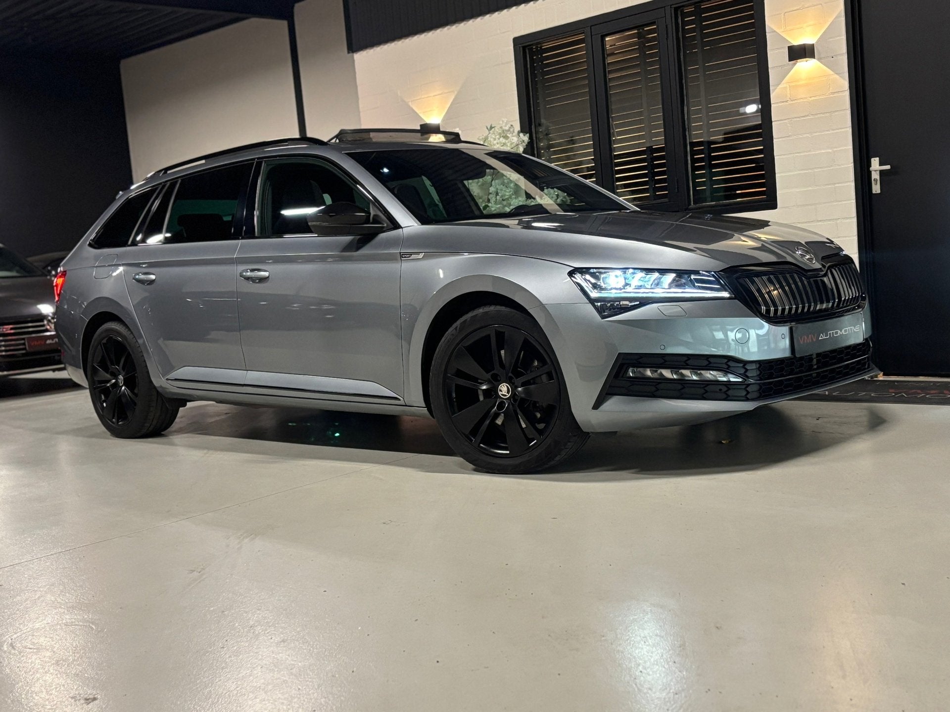 Skoda Superb Combi 1.4 TSI iV 218 PK | Sportline | Pano | Ch, Auto's, Dealer onderhouden, Gebruikt, Zwart, 4 cilinders
