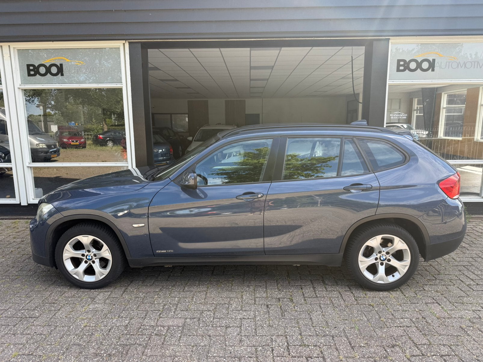 BMW X1 2.0 Sdrive 18I INCL BTW Clima navi trekhaak, Auto's, BMW, X1, 1995 cc, Zwart, 4 cilinders