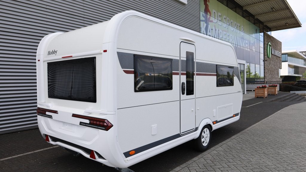 Hobby De Luxe 460 UFE NIEUW 2027 NIEUW, Caravans en Kamperen, Rondzit, Hobby, Serviceluik, Bedrijf